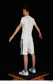  Johnny Reed dressed grey shorts sneakers sports standing white t shirt whole body 0012.jpg